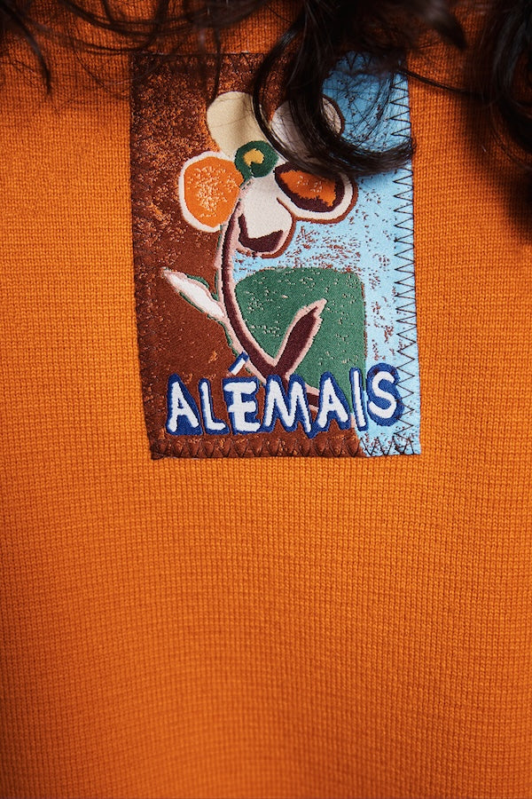 CLAUDIA TANGERINE KNIT POLO
