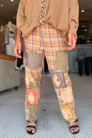 TRAVELING ON PANTS - PATCHED TOGETHER